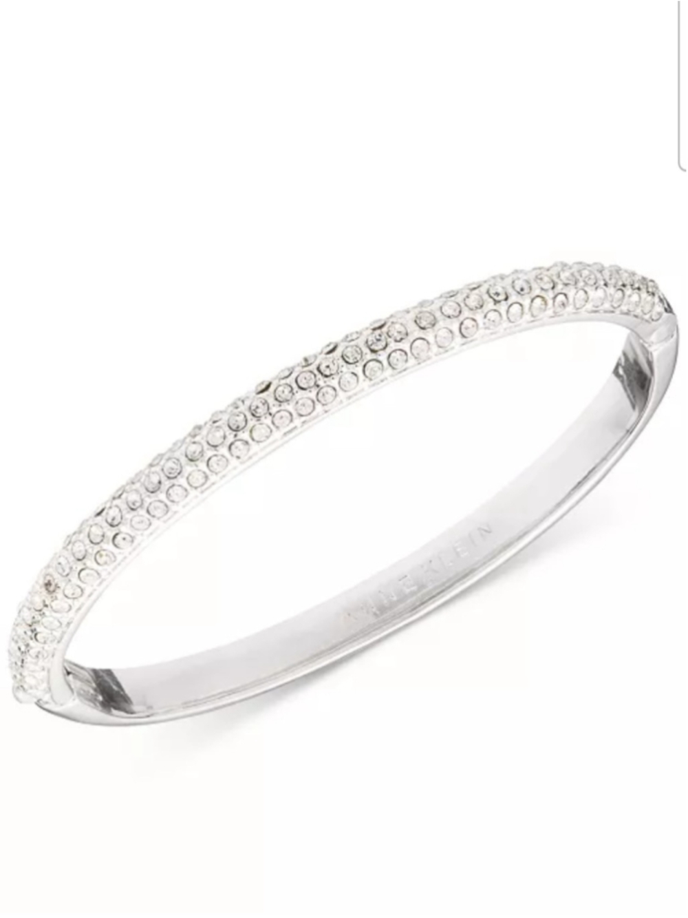 Anne Klein Crystal Pavé Bangle Bracelet. With hinged closure